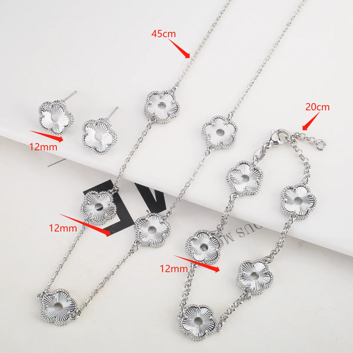 Hollow Metal Double sided Hollow Jewelry Set Sparkling Hot Selling Plum Blossom Jewelry Set Creative New Design For Women Clover