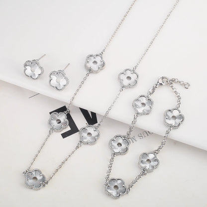 Hollow Metal Double sided Hollow Jewelry Set Sparkling Hot Selling Plum Blossom Jewelry Set Creative New Design For Women Clover
