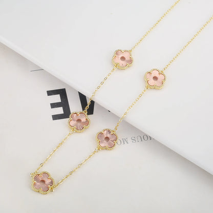 Hollow Metal Double sided Hollow Jewelry Set Sparkling Hot Selling Plum Blossom Jewelry Set Creative New Design For Women Clover