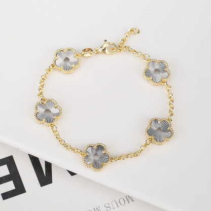 Hollow Metal Double sided Hollow Jewelry Set Sparkling Hot Selling Plum Blossom Jewelry Set Creative New Design For Women Clover