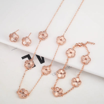 Hollow Metal Double sided Hollow Jewelry Set Sparkling Hot Selling Plum Blossom Jewelry Set Creative New Design For Women Clover