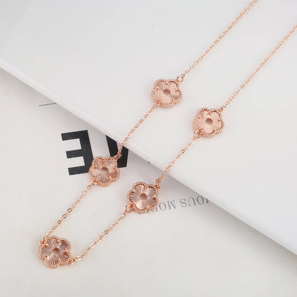 Hollow Metal Double sided Hollow Jewelry Set Sparkling Hot Selling Plum Blossom Jewelry Set Creative New Design For Women Clover