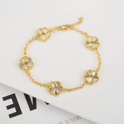 Hollow Metal Double sided Hollow Jewelry Set Sparkling Hot Selling Plum Blossom Jewelry Set Creative New Design For Women Clover