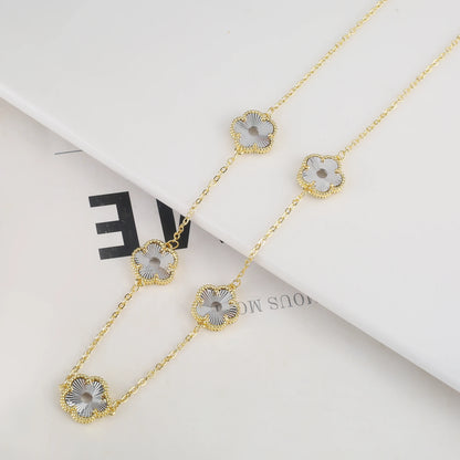 Hollow Metal Double sided Hollow Jewelry Set Sparkling Hot Selling Plum Blossom Jewelry Set Creative New Design For Women Clover